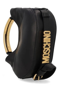 Black leather Moschino women’s handle me bag with gold-tone handle and bold vertical Moschino lettering
