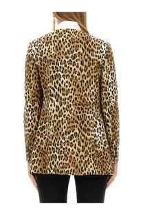 Moschino women’s leopard print blazer in tan and black spots featuring a bold classic pattern