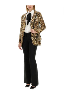 Moschino women’s leopard-print blazer with tailored fit and classic lapel collar in stylish pattern design