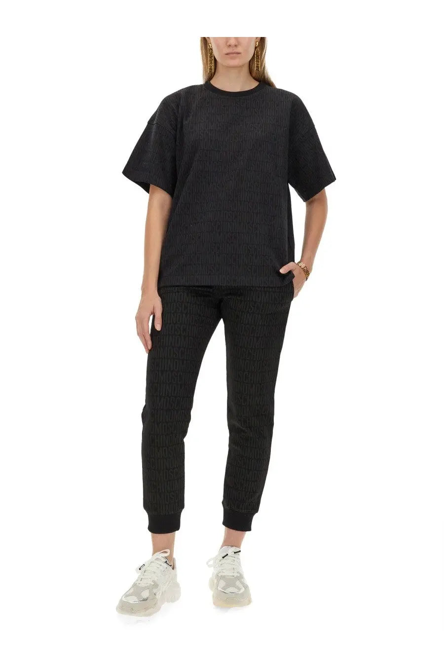 Black ribbed knit two-piece set featuring joggers and a matching top by moschino women’s casual wear