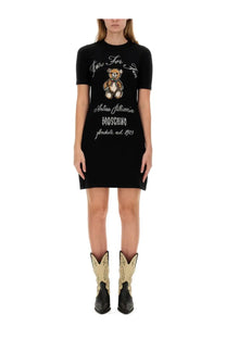 Moschino women’s black knit short-sleeved dress with embroidered white teddy bear and script text