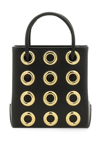 Moschino women’s black leather handbag with gold-tone circular grommets and black top handles