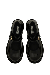 Moschino women’s mary jane olivia black patent leather shoes with gold tone buckle details and chunky sole