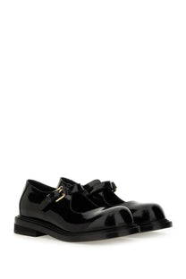 Moschino women’s mary jane olivia black patent leather shoes with gold-tone buckle details