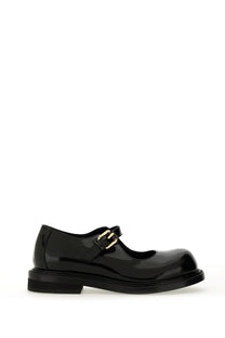 Moschino womens mary jane olivia black patent leather shoe with gold tone buckle and chunky sole