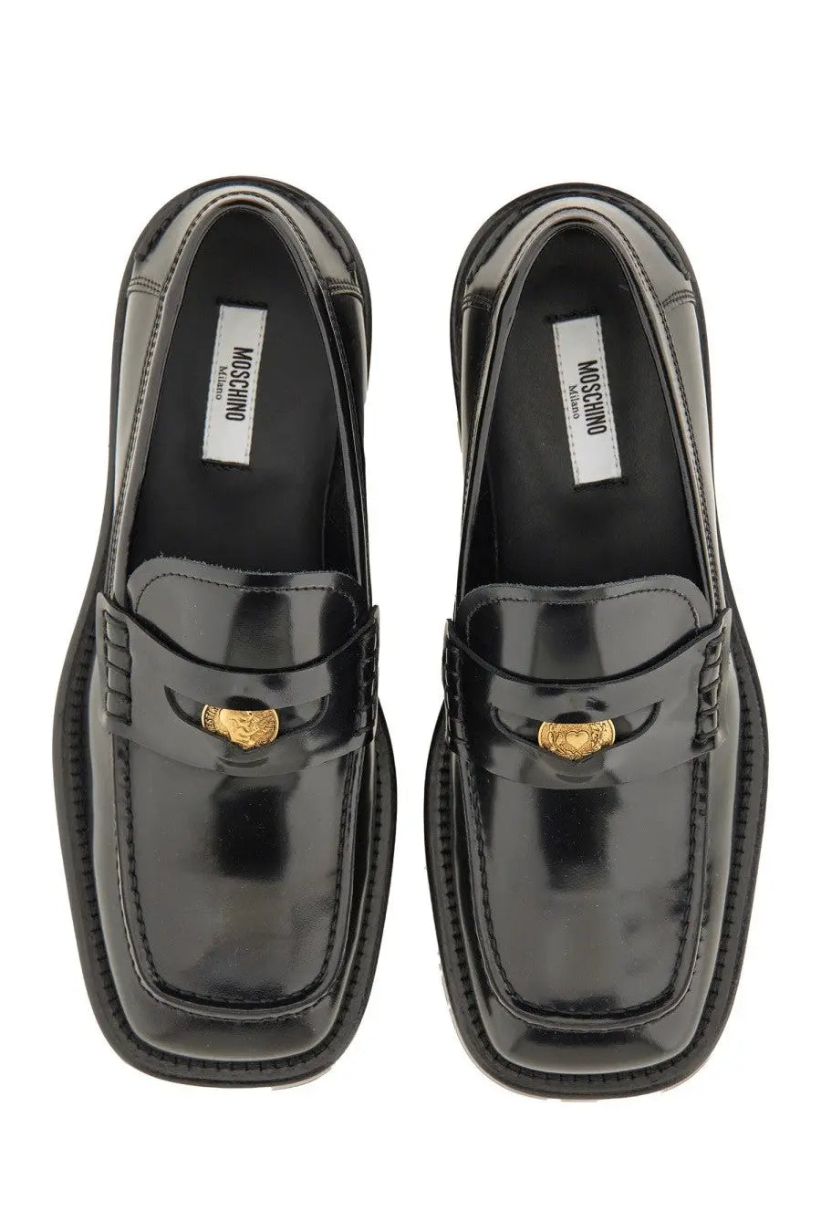 Moschino women’s black patent leather moccasin loafers with gold tone medusa head buckles and square toe