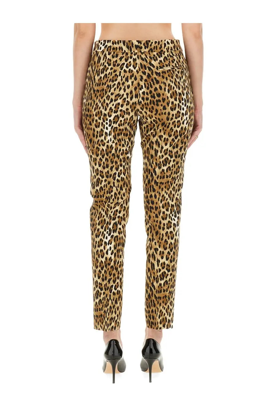 Tight-fitting Moschino women’s pants with leopard print in tan and black on smooth fabric