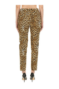 Tight-fitting Moschino women’s pants with leopard print in tan and black on smooth fabric