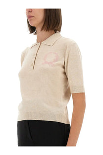 Beige knitted Moschino women’s polo shirt with a subtle pink embroidered crest on the chest