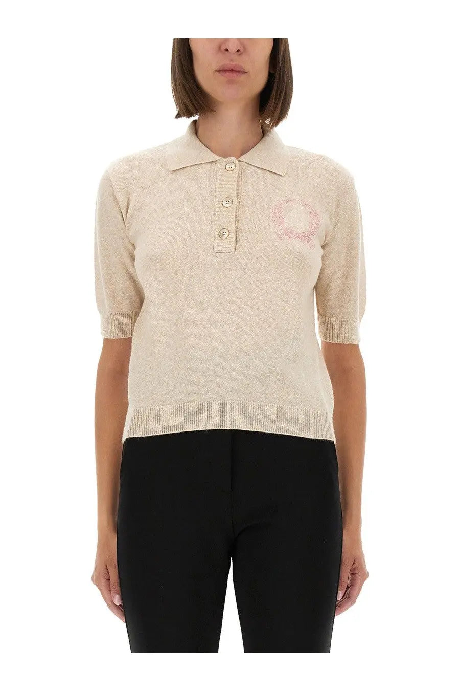 Beige knitted polo shirt by Moschino with a subtle pink embroidered logo on the chest for women