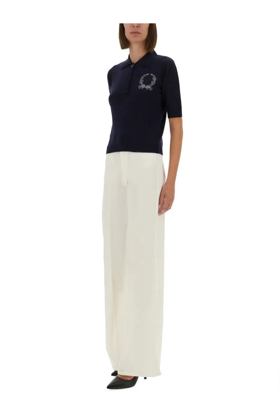 Navy blue Moschino women’s short-sleeved polo shirt with white embroidered laurel wreath on the chest