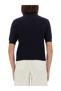 Navy blue short-sleeved knit polo shirt by Moschino for women perfect for casual and smart casual wear