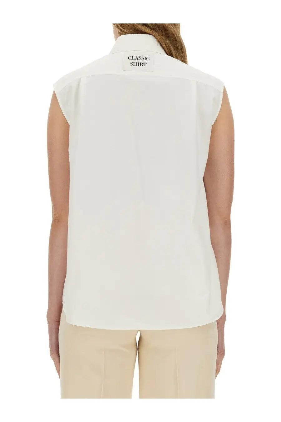 Moschino women’s white sleeveless poplin shirt with a crisp collar and subtle texture perfect for classic looks