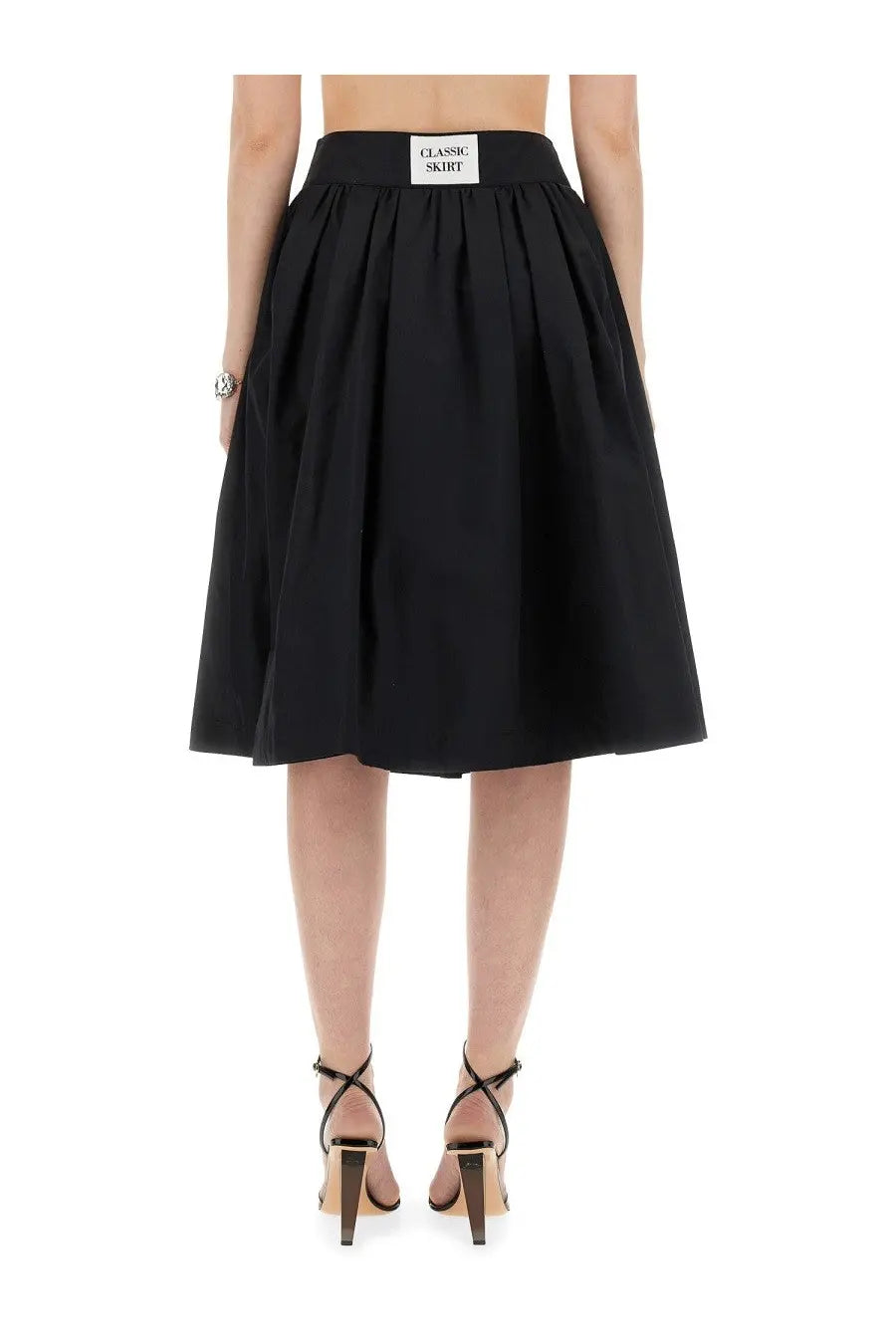 Moschino women’s black poplin pleated midi skirt with a white classic skirt label at the waistband