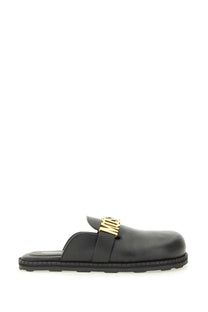Black leather slip-on mule with gold-tone Moschino logo buckle for women Sabot style