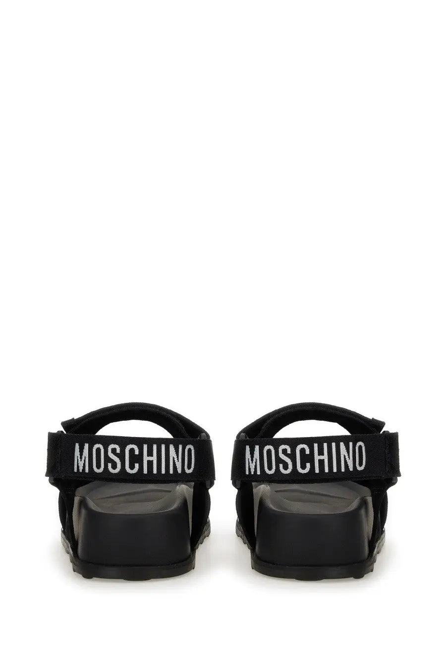 Moschino women’s black sandals with chunky sole and white embroidered logo band on the front side