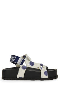 Moschino women’s white platform sandal with purple glitter polka dots and navy blue strap featuring moschino logo