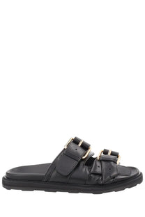 Moschino women’s black leather slide sandal with two gold-tone buckle straps and chunky rubber sole
