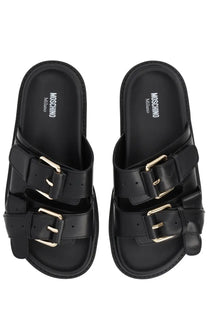 Moschino women’s sandalo tie black sandals with dual gold-tone buckle straps and thick platform sole