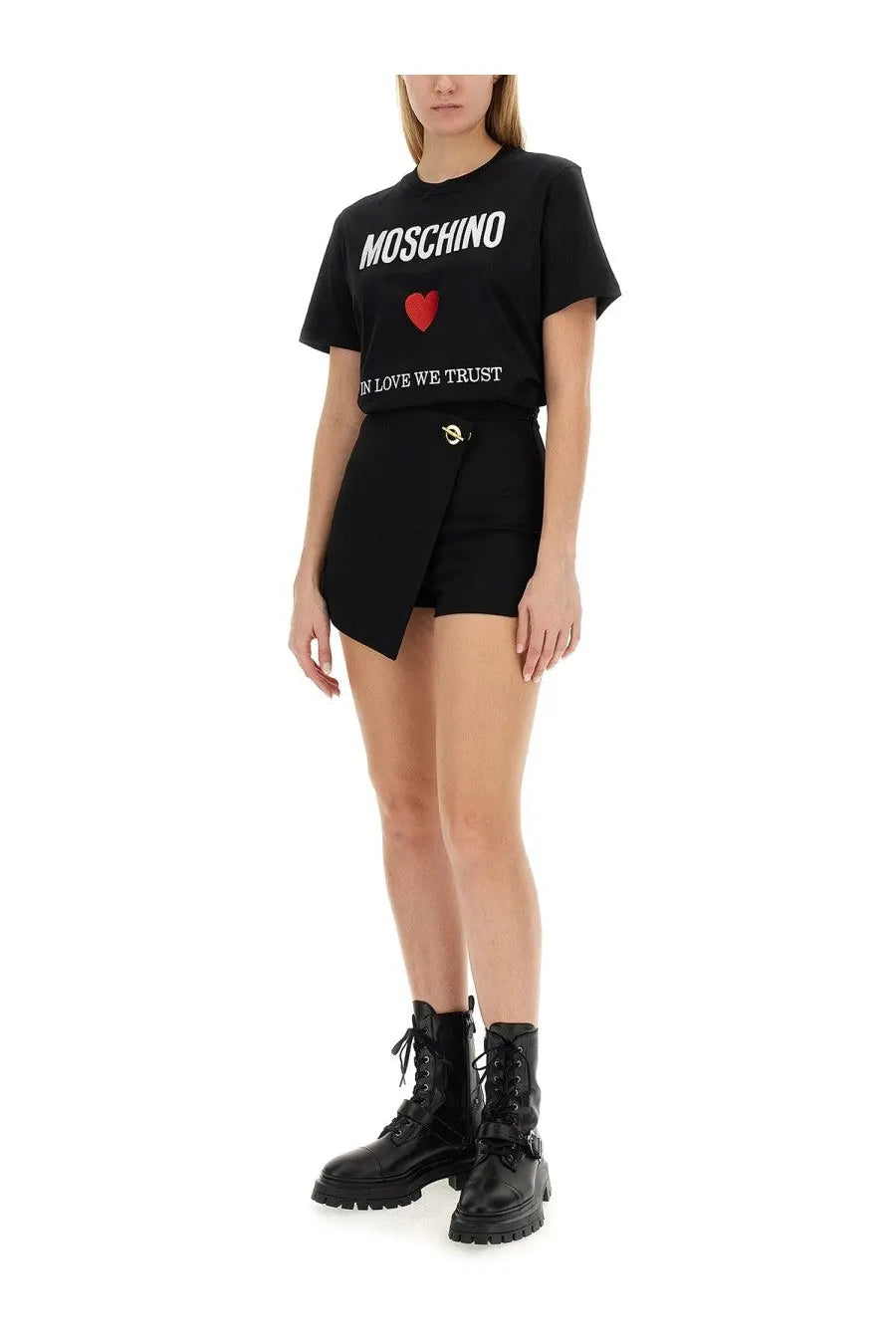 Moschino women’s black t-shirt with bold white lettering and red heart graphic on the front