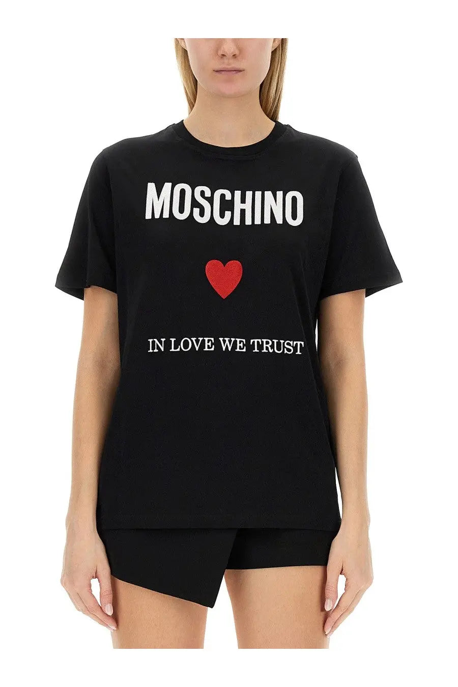 Moschino women’s black t-shirt with white moschino lettering red heart emblem and in love we trust phrase printed below