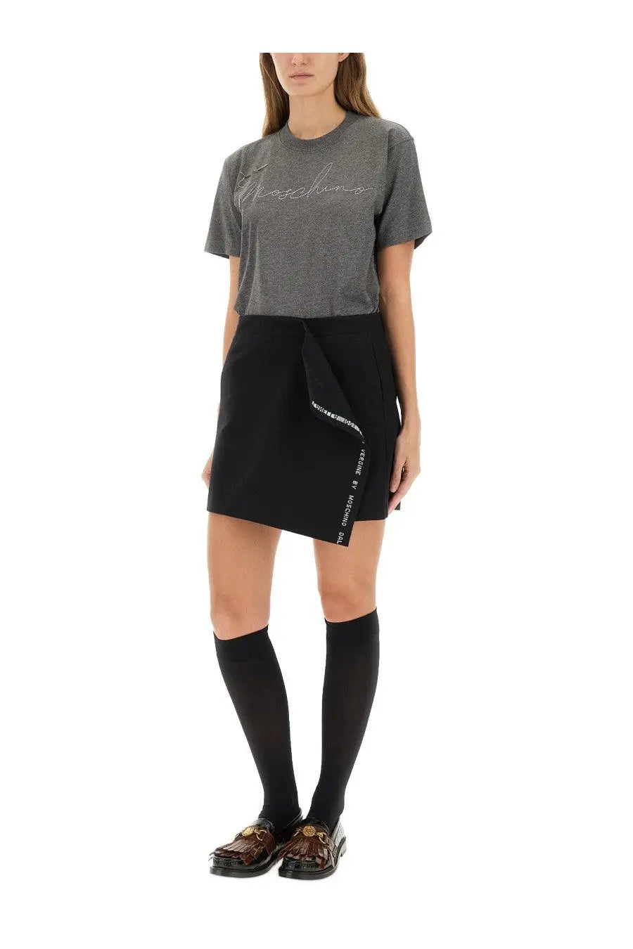 Black wrap skirt with white text detailing along the side seam paired with moschino womens grey shirt