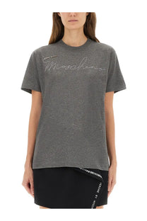 Moschino women’s grey heathered t-shirt with white cursive logo across the chest made from soft cotton blend