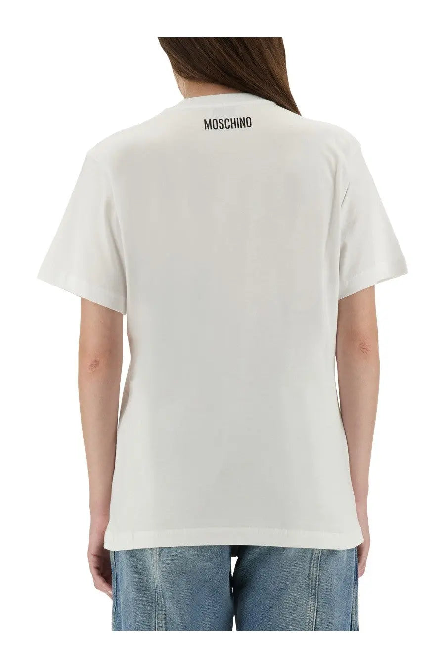 White Moschino women’s shirt featuring a black logo printed at the neckline for casual wear