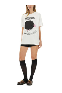 White moschino women’s t-shirt with black sheep graphic featuring pink nose and legs above bold bellissima text