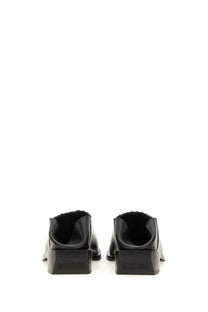 Moschino women’s shootie Cuban heel black leather loafers with a glossy finish and distinctive block heels