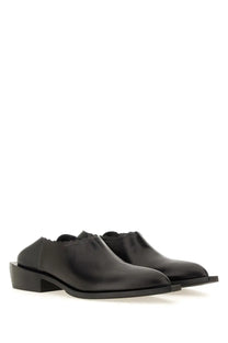 Moschino women’s black leather slip-on shootie loafers with low block cuban heel and minimalist design