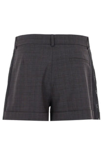 Moschino women’s dark gray shorts with subtle checkered pattern and black side stripes for casual wear