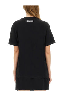 Black Moschino women’s smiley t-shirt featuring a white logo at the neckline in soft cotton material