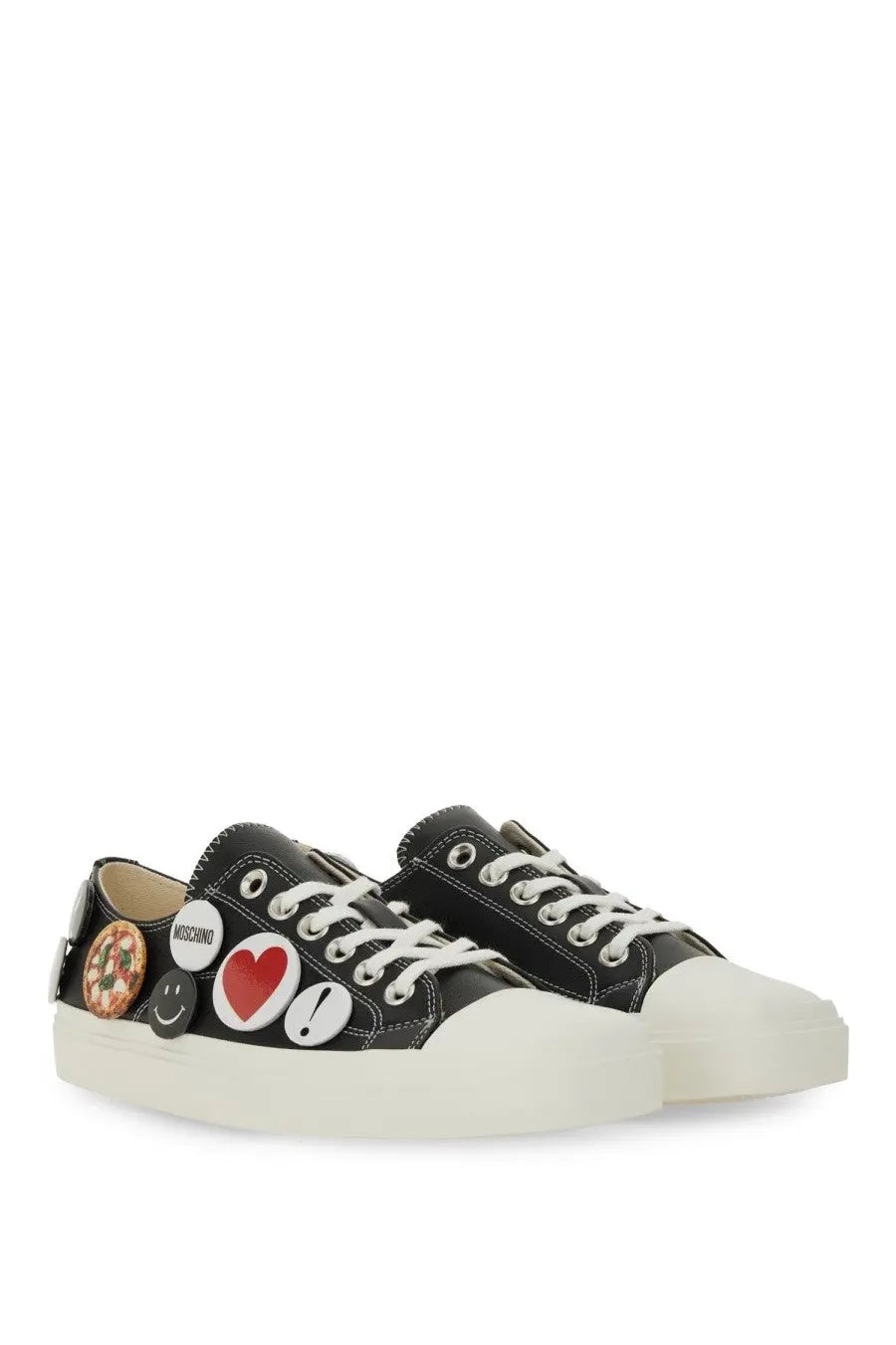 Moschino women’s black canvas low-top sneakers with white laces thick off-white sole and colorful pin badges