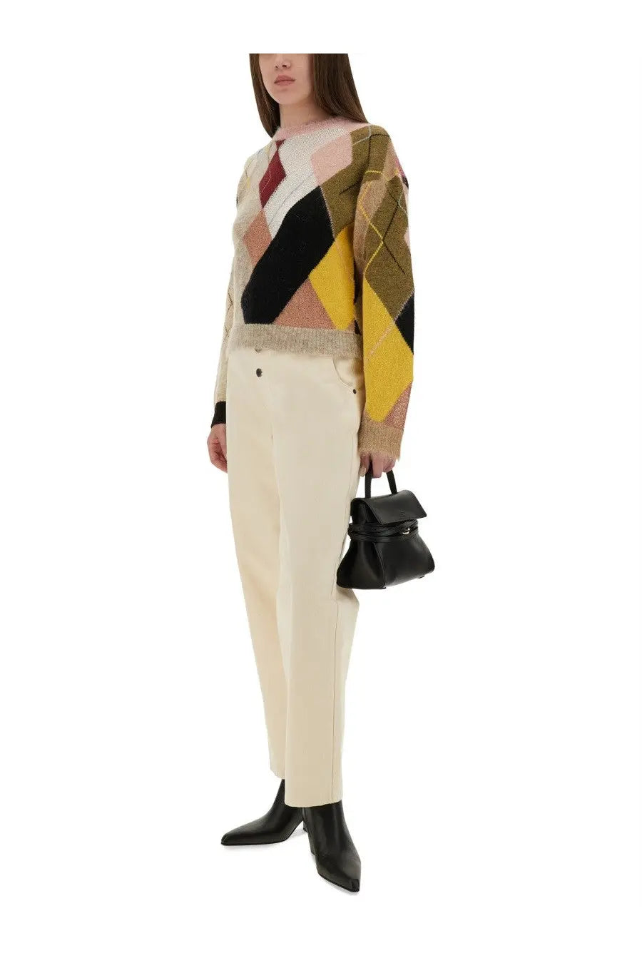 Black structured mini handbag with top handle and minimalist design paired with Moschino beige straight fit jeans