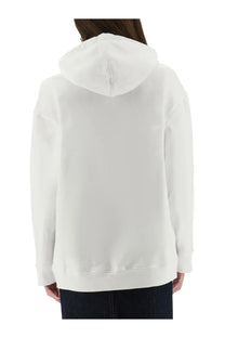 Moschino women’s white hooded sweatshirt with soft relaxed fit and ribbed cuffs made from comfortable fabric