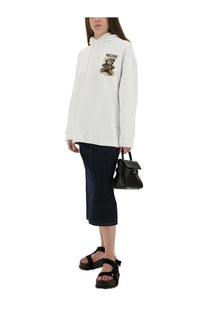 Moschino women’s white cotton hoodie with embroidered bear logo on the chest perfect for casual wear