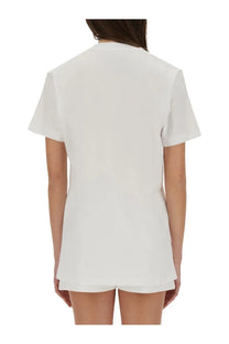 Moschino women’s white short-sleeved t-shirt with relaxed fit and minimalist teddy bear design in cotton material