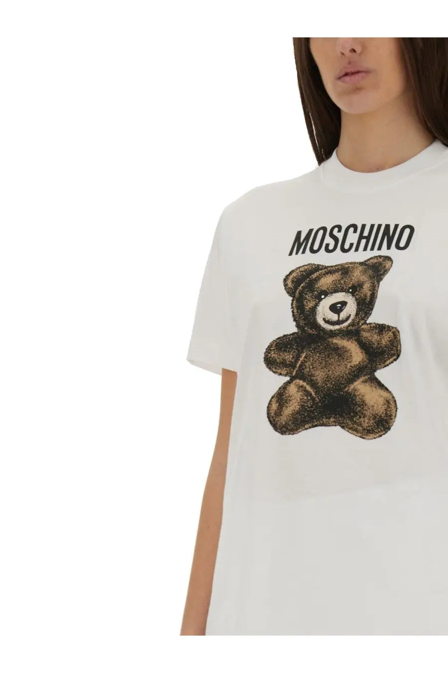 Moschino women’s white cotton t-shirt featuring a brown teddy bear graphic with black text above it