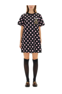 Black moschino polka dot dress with pink circular patterns and teddy bear patch on the chest for women