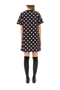 Moschino women’s black short-sleeved teddy dress with pink polka dots featuring soft fabric and playful design