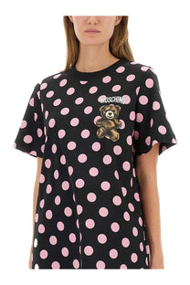 Black moschino women’s t-shirt dress with pink polka dots and brown teddy bear patch on chest