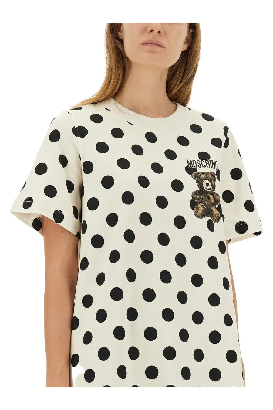 Moschino women’s white off-white t-shirt with bold black polka dots and brown teddy bear graphic on chest