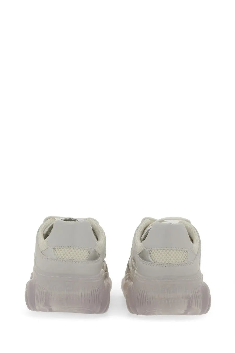 A pair of Moschino womens teddy sneaker white off-white chunky mesh sneakers with translucent textured rubber sole