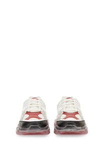 Moschino women’s teddy sneaker white with red accents and chunky translucent sole featuring black toe cap details