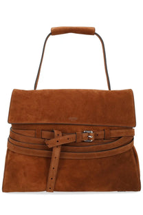Tan suede moschino women’s tie me handbag with top handle and multiple silver buckle belt straps