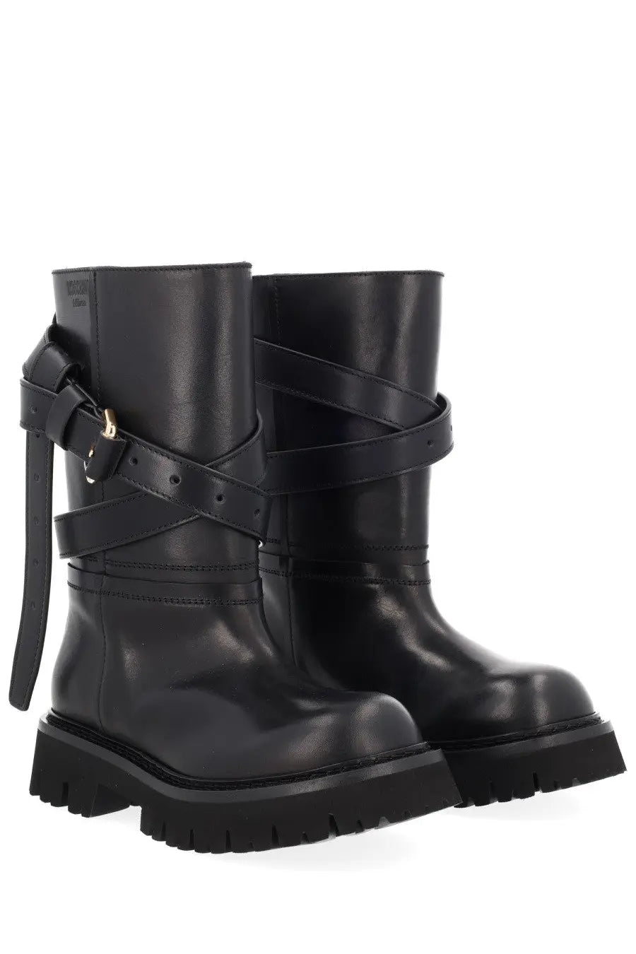 Moschino women’s black leather combat boots with thick soles and crisscrossing straps for edgy style