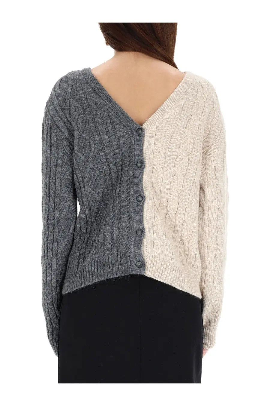 Moschino women’s two tone cable knit cardigan with gray left side cream right side and dark buttons down center