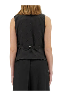 Moschino women’s black virgin wool vest with subtle geometric pattern and matching belt at the waist