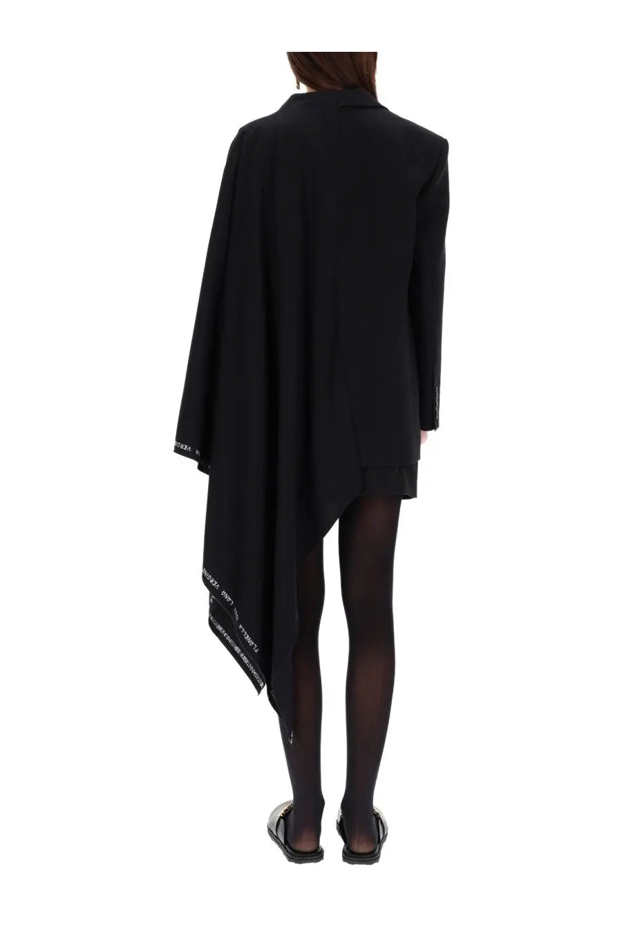 Moschino women’s black wool flannel blazer with asymmetrical draped silhouette and white text detailing along hem